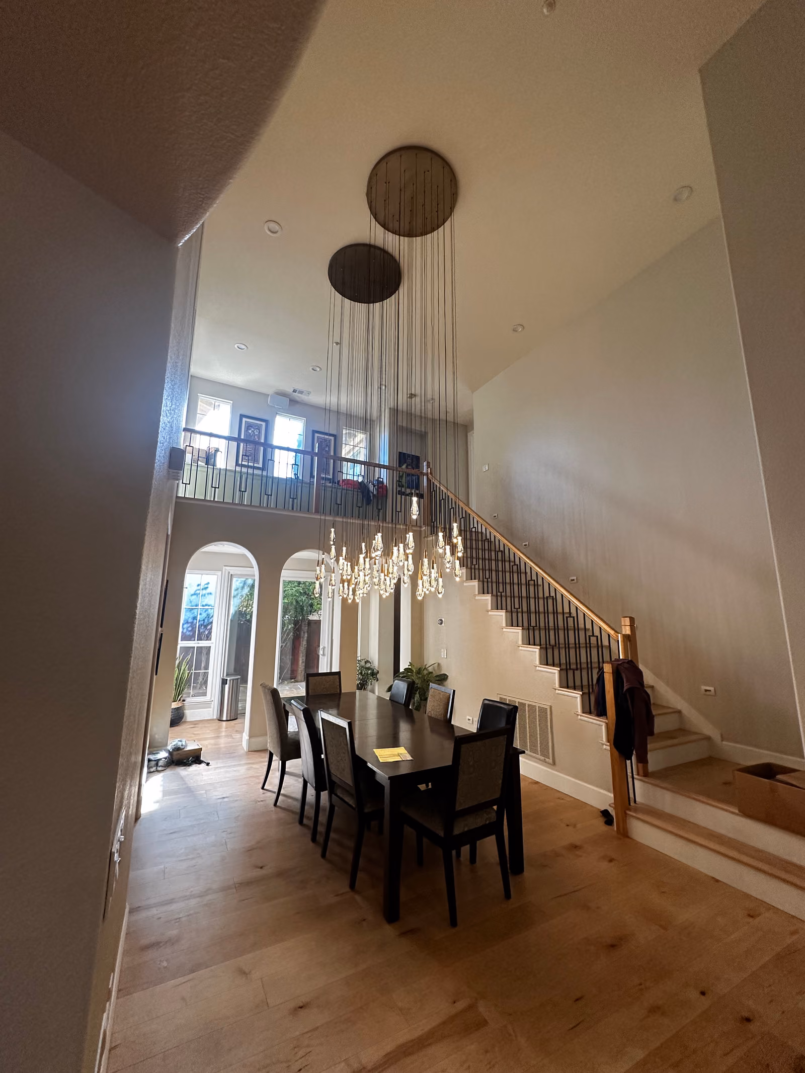 Cascading pendant lighting on a staircase